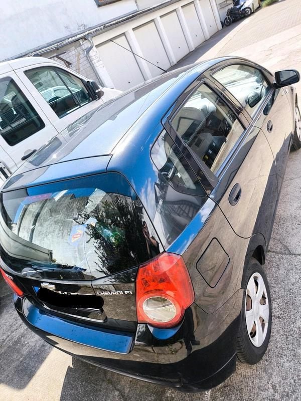 Second-hand Chevrolet Aveo 85 CP (62 kW) 2011 Negru Hatchback