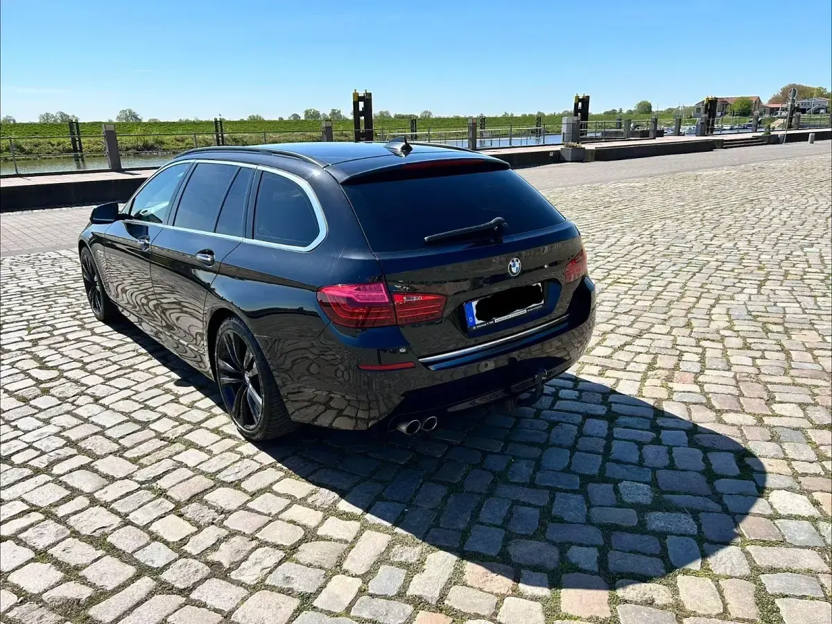 Second-hand BMW 520 Luxury Line 190 CP (139 kW) 2015 Negru Break