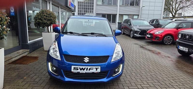 Blau Gebraucht 2015 Suzuki Swift Club Kleinwagen | 8.900 € (Fairer Preis) - Bild 1/4