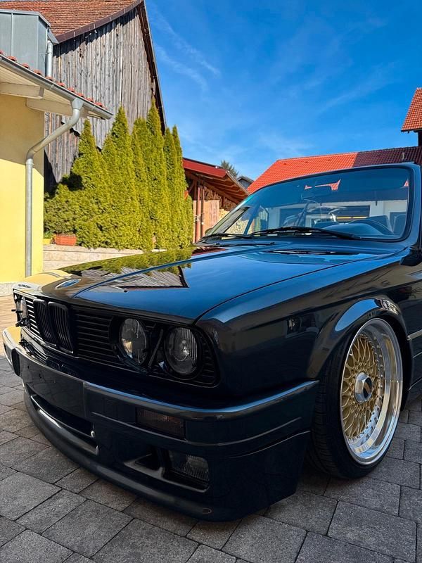 Gebraucht BMW 325 Cabriolet 170 PS (125 kW) 1992 Schwarz Cabrio