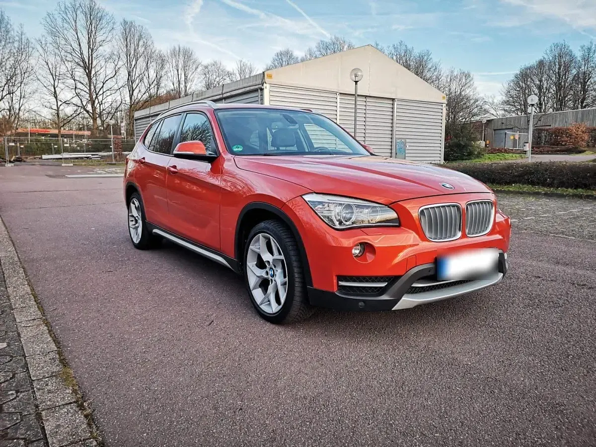Gebraucht BMW X1 xLine 184 PS (135 kW) 2012 Orange SUV