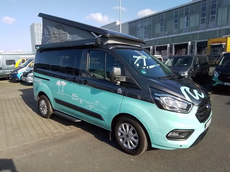 Grau Gebraucht 2022 Ford Transit Custom Nugget Van / Kleinbus | 53.900 € (Etwas zu teuer) - Bild 1/4