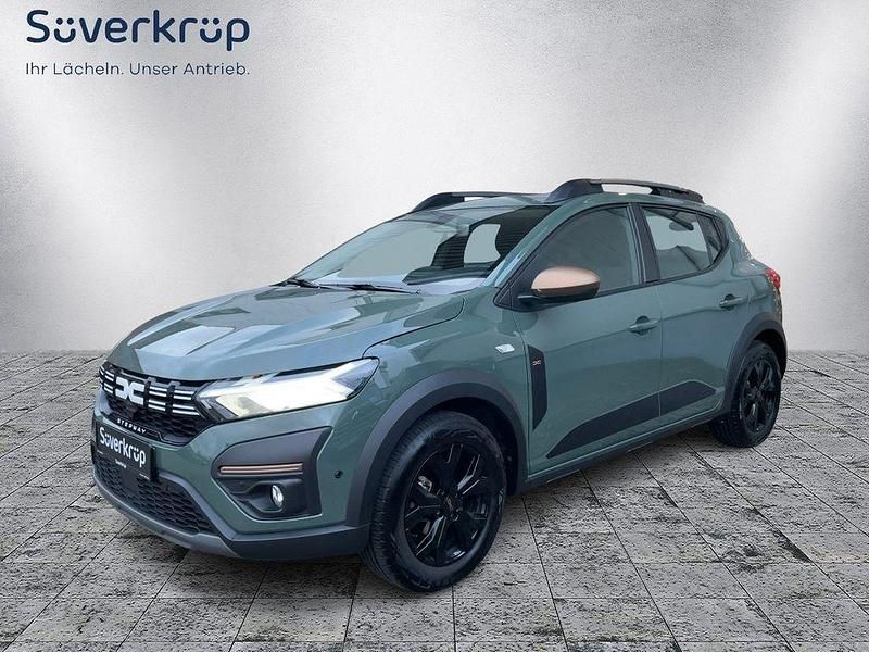 Grau Gebraucht 2024 Dacia Sandero Extreme Limousine | 16.980 € (Fairer Preis) - Bild 1/4