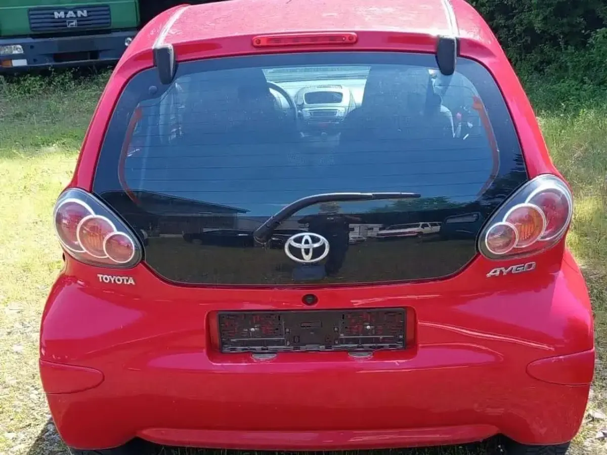 Gebraucht Toyota Aygo 68 PS (50 kW) 2009 Rot Kleinwagen