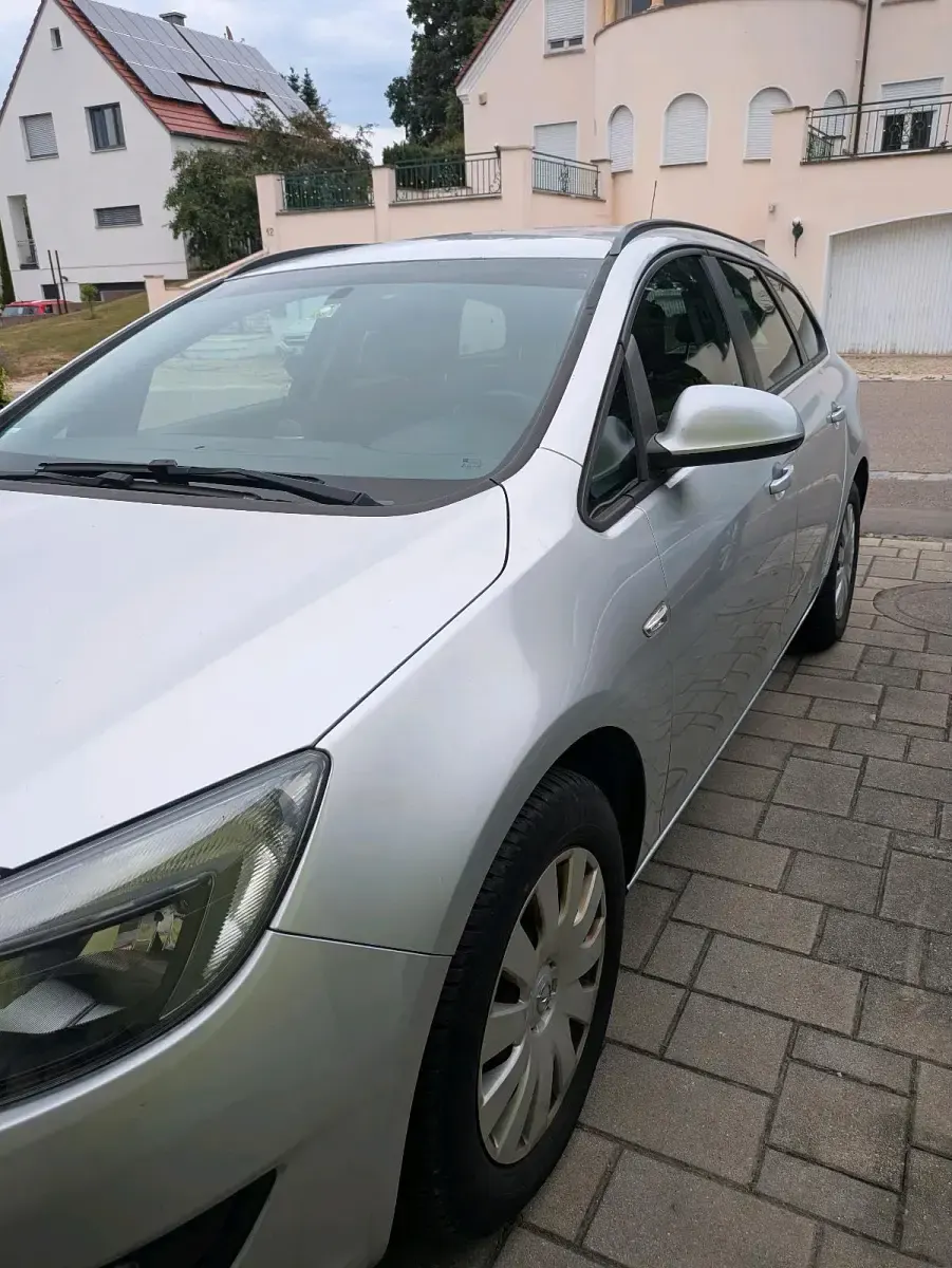 Gebraucht Opel Astra Style 110 PS (80 kW) 2014 Silber Kombi
