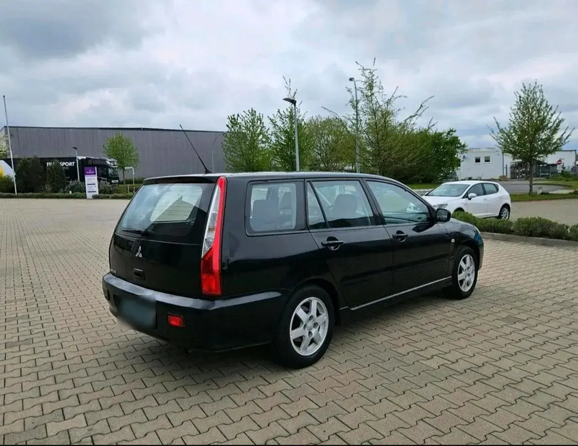 Second-hand Mitsubishi Lancer 100 CP (73 kW) 2004 Negru Break