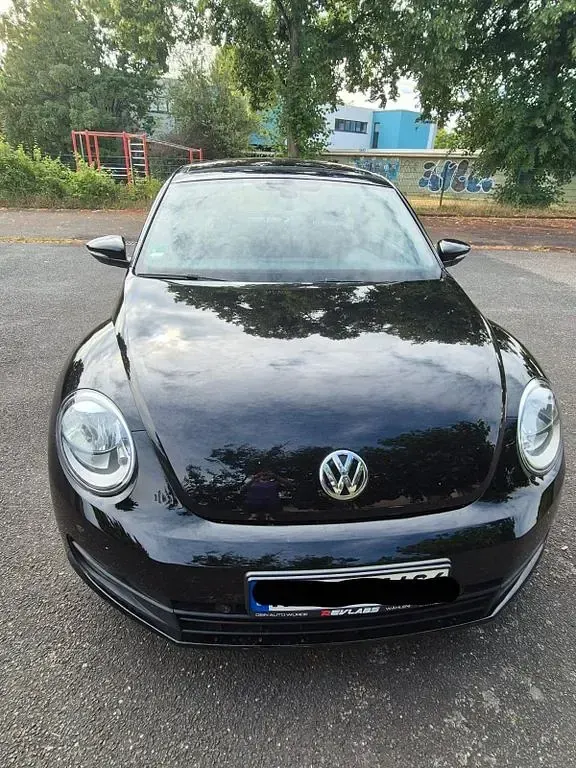 Gebraucht VW Beetle Comfortline 105 PS (77 kW) 2012 Schwarz Kleinwagen