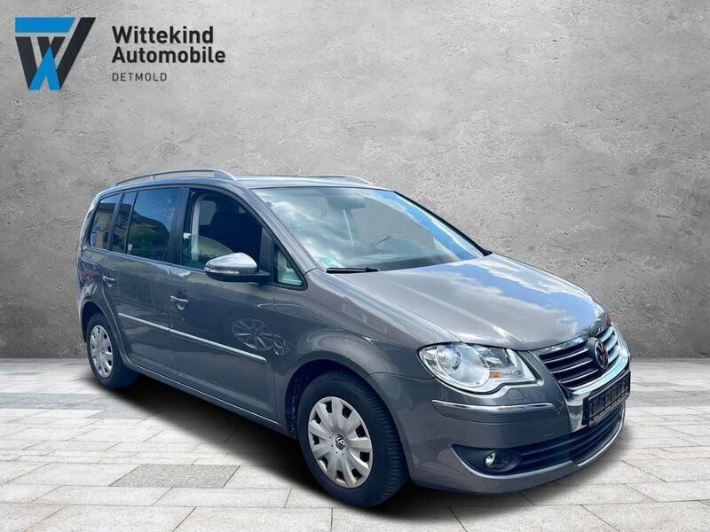 Grau Gebraucht 2010 VW Touran Highline Van / Kleinbus | 3.999 € (Superpreis) - Bild 1/4