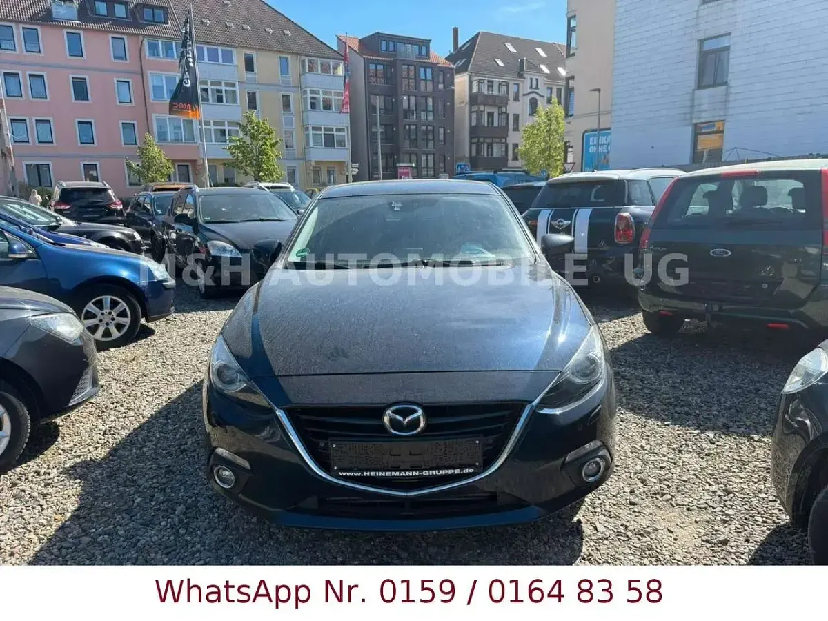 Second-hand Mazda 3 Prime-Line 150 CP (110 kW) 2014 Negru Berlinǎ