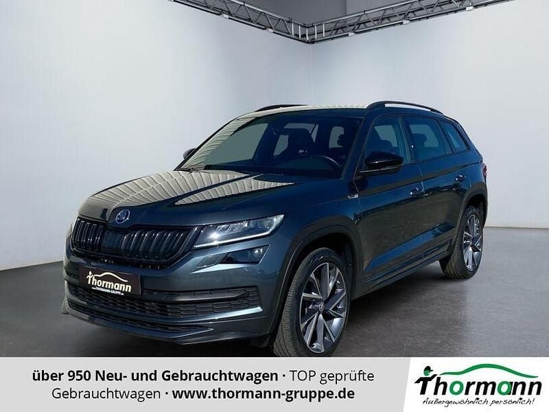 Quarzgrau Gebraucht 2021 Skoda Kodiaq SportLine SUV | 30.572 € (Guter Preis) - Bild 1/4