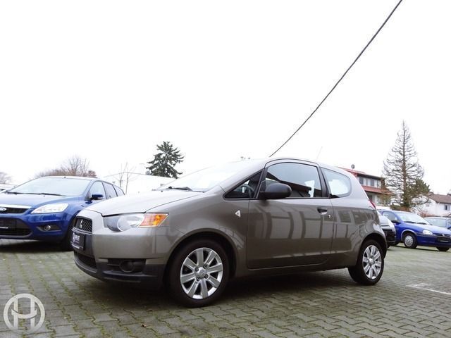 Gebraucht Mitsubishi Colt Inform 75 PS (55 kW) 2010 Grau metallic Kleinwagen