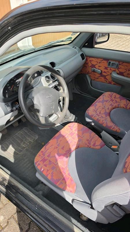 Gebraucht Nissan Micra 54 PS (39 kW) 1999 Schwarz Kleinwagen