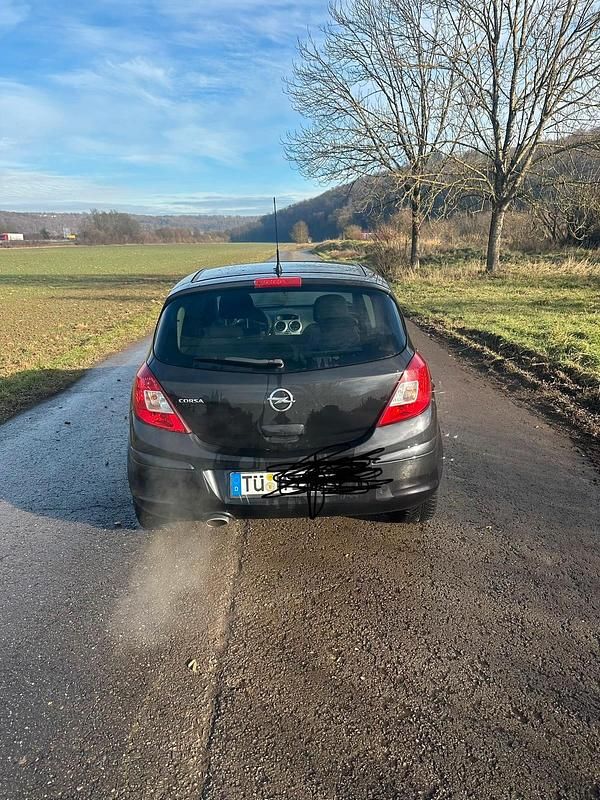 Gebraucht Opel Corsa 70 PS (51 kW) 2011 Schwarz Kleinwagen