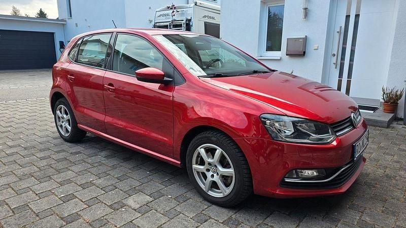 Second-hand VW Polo 110 CP (80 kW) 2016 Portocaliu Berlinǎ