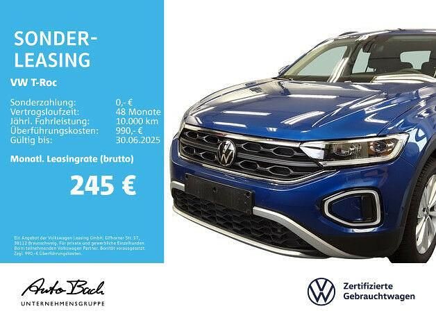 Blau (ravennablau metallic) Gebraucht 2024 VW T-Roc Life SUV | 29.470 € (Fairer Preis) - Bild 1/2