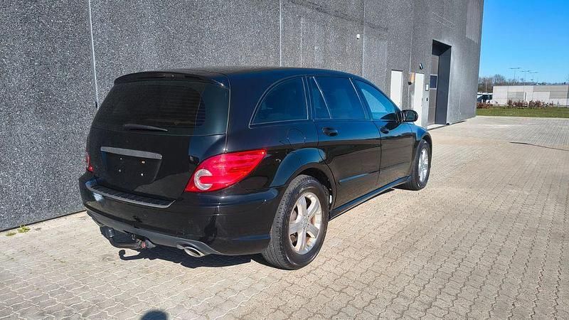 Schwarz Gebraucht 2008 Mercedes R320 AMG Van / Kleinbus | 4.499 € (Fairer Preis) - Bild 1/4
