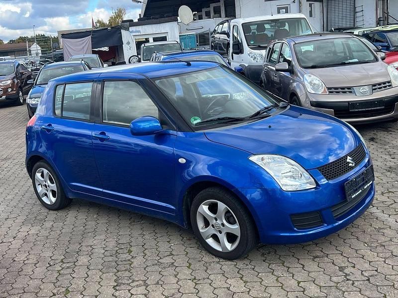 Blau Gebraucht 2009 Suzuki Swift Limousine | 1.899 € (Fairer Preis) - Bild 1/4