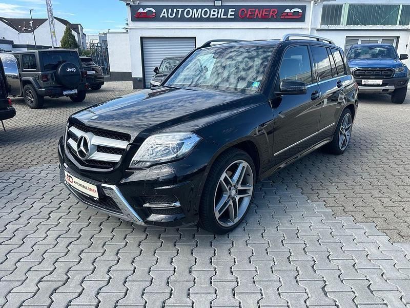 Schwarz Gebraucht 2013 Mercedes GLK200 AMG line SUV | 13.990 € - Bild 1/4