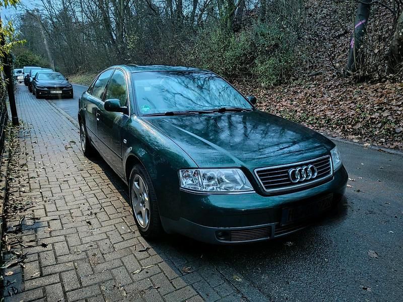 Grün Gebraucht 1997 Audi A6 Limousine | 1.000 € (Superpreis) - Bild 1/4