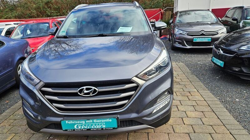 Grau Gebraucht 2015 Hyundai Tucson Intro Edition SUV | 15.900 € (Fairer Preis) - Bild 1/4
