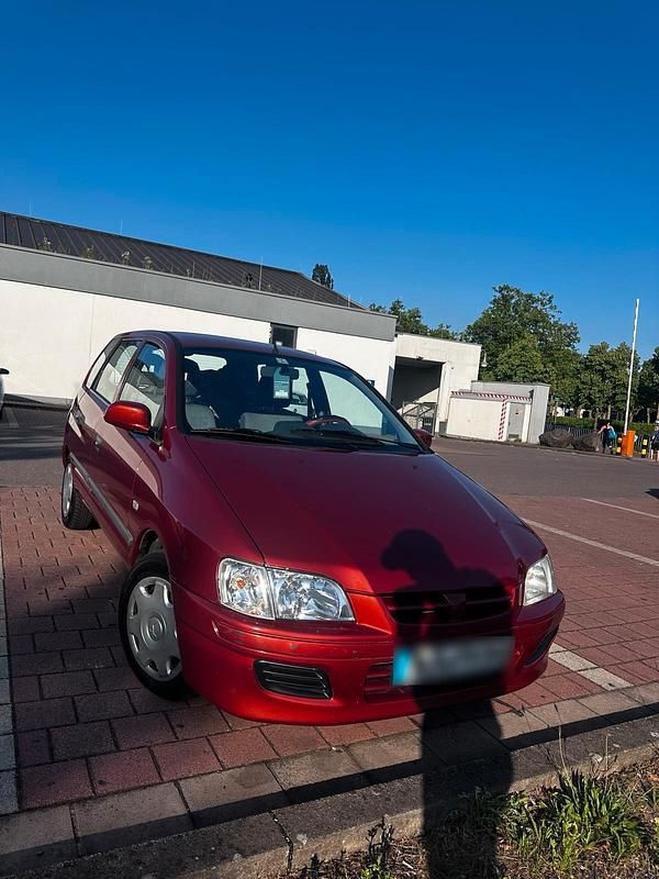 Gebraucht Mitsubishi Space Star 82 PS (60 kW) 2002 Rot Van / Kleinbus