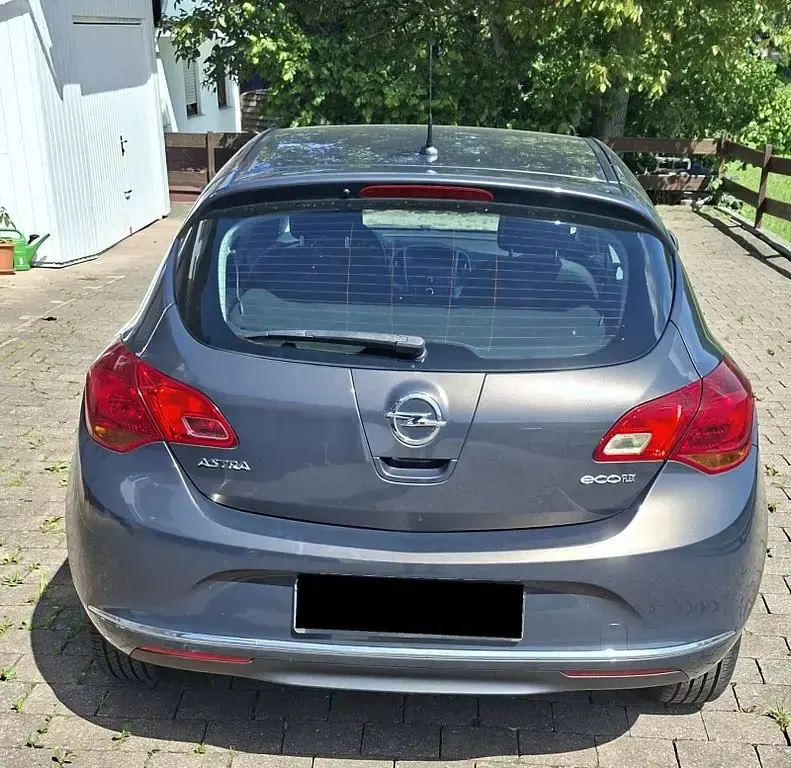 Używany Opel Astra 101 KM (74 kW) 2015 Szary Sedan/Limuzyna