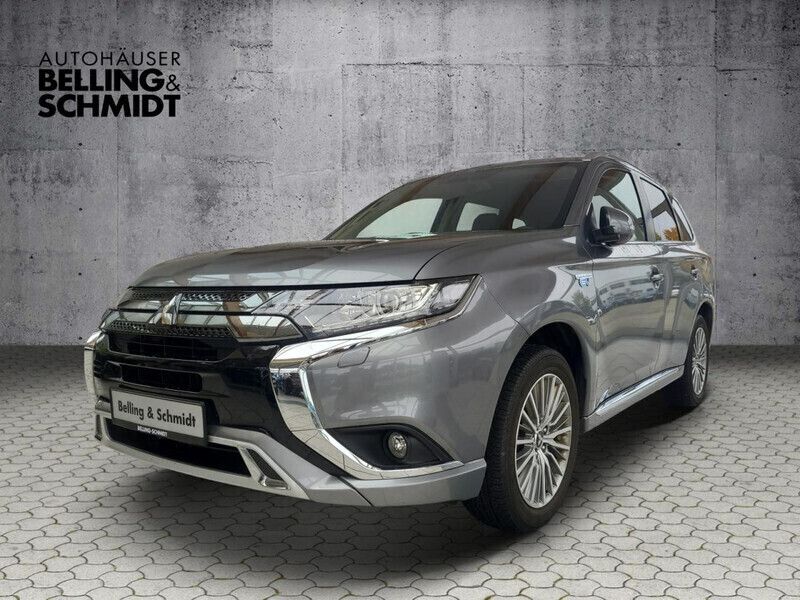Grau Gebraucht 2021 Mitsubishi Outlander P-HEV SUV | 24.990 € (Fairer Preis) - Bild 1/4