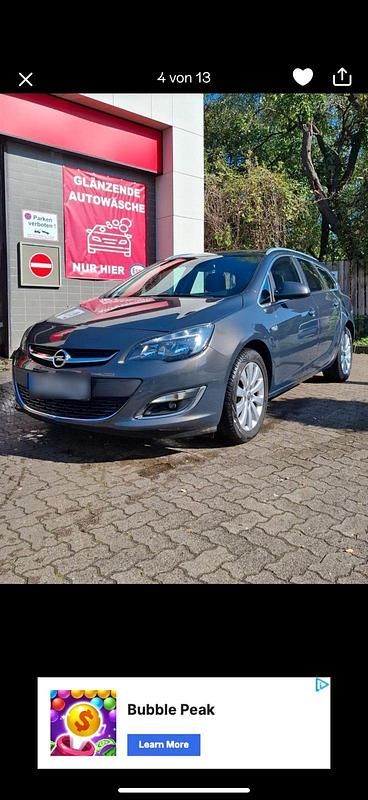 Gebraucht Opel Astra 131 PS (96 kW) 2014 Grau Kombi