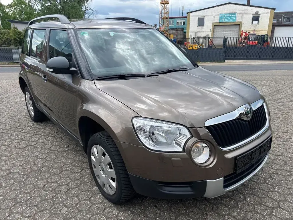 Używany Skoda Yeti 105 KM (77 kW) 2011 Brązowy SUV