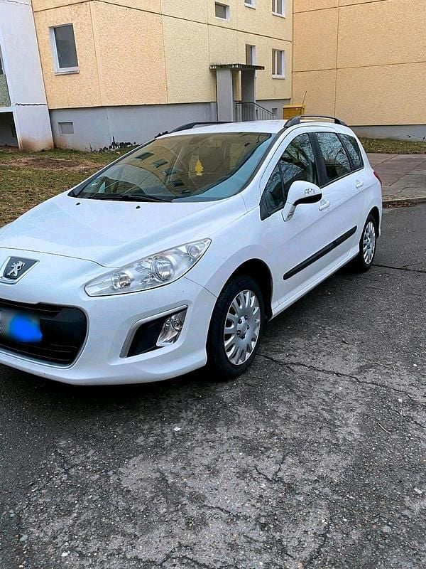 Gebraucht Peugeot 308 105 PS (77 kW) 2012 Weiß Kombi