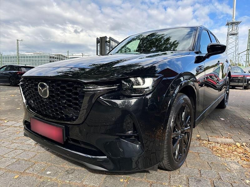 Schwarz metallic Gebraucht 2024 Mazda CX-60 Homura-Line SUV | 48.620 € (Etwas zu teuer) - Bild 1/4