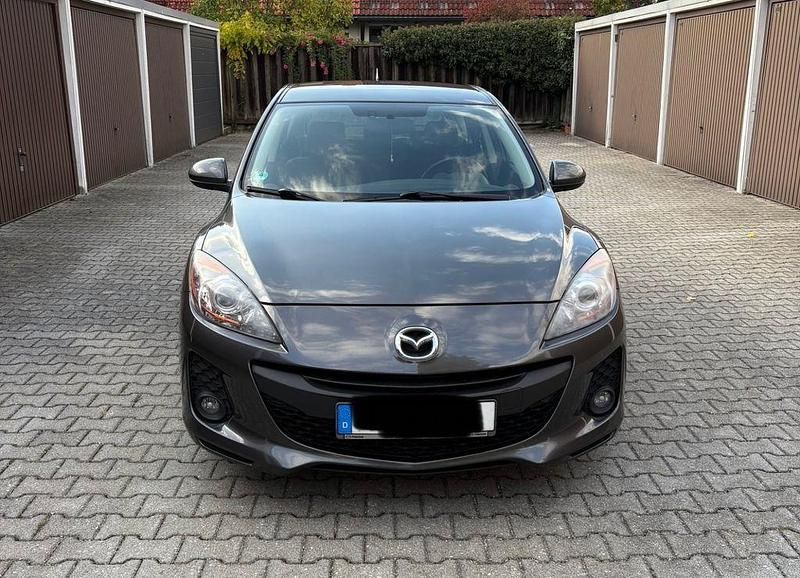 Grau Gebraucht 2013 Mazda 3 Prime-Line Limousine | 4.500 € (Fairer Preis) - Bild 1/4