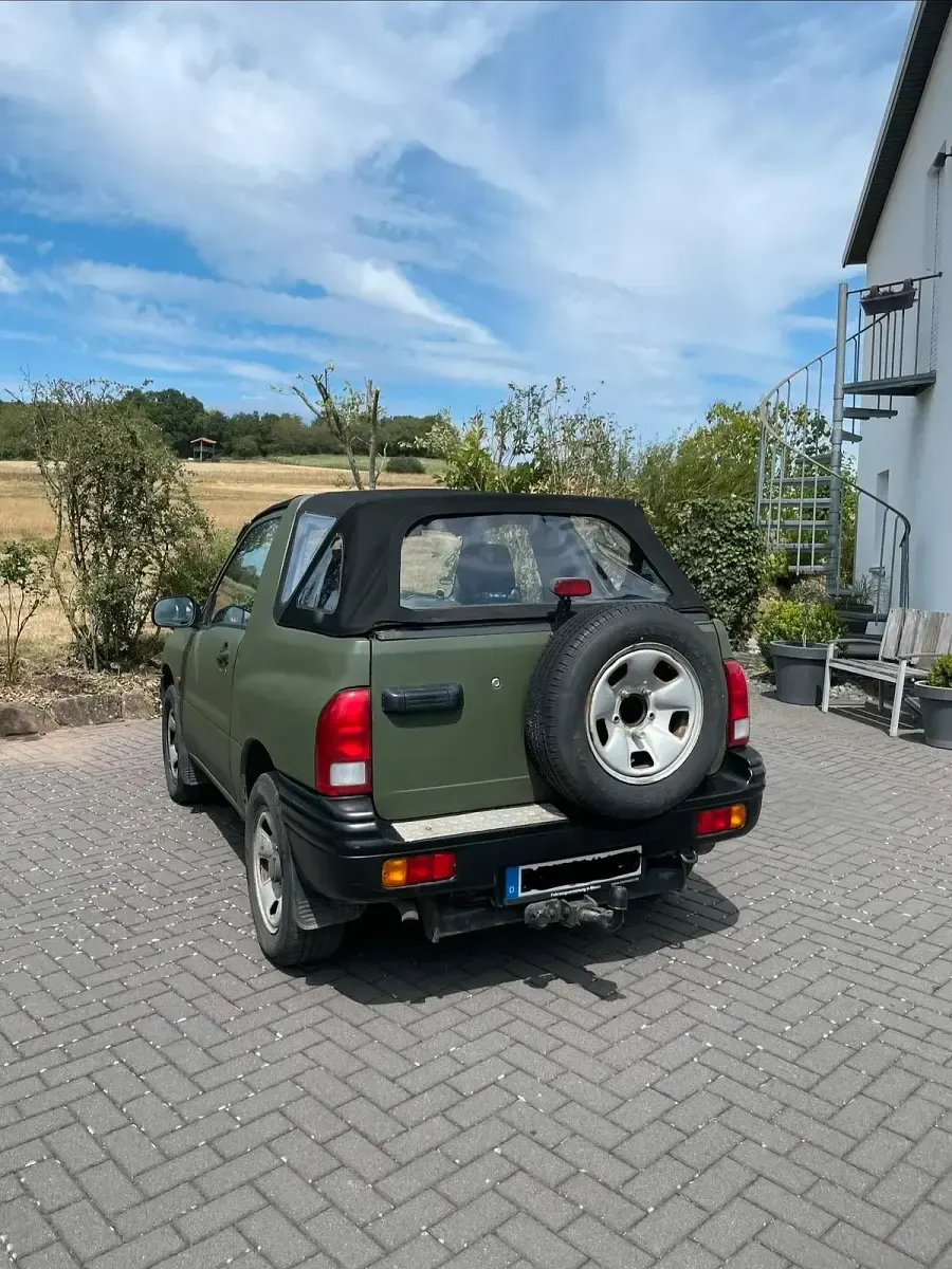 Gebraucht Suzuki Grand Vitara 12 PS (8 kW) 1999 Grün Cabrio