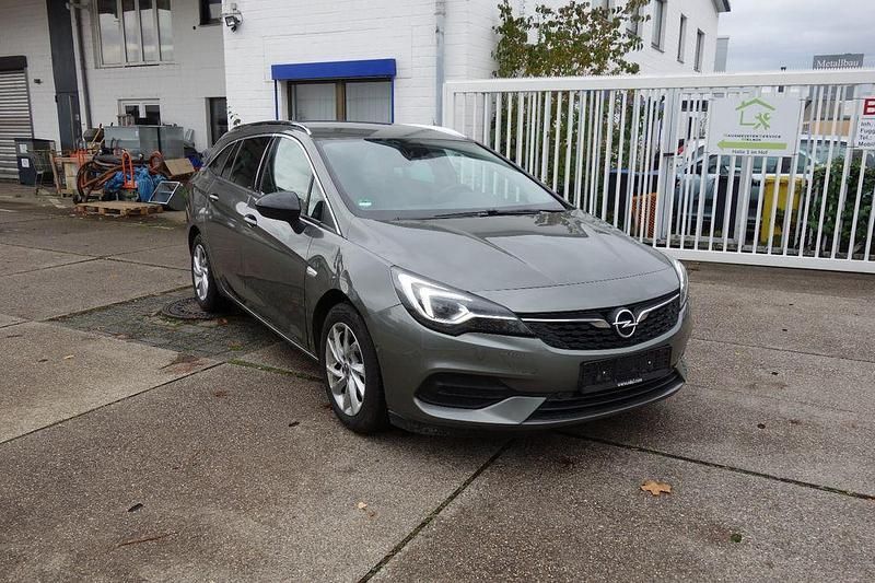 Grau Gebraucht 2022 Opel Astra Business Elegance Kombi | 7.999 € - Bild 1/4