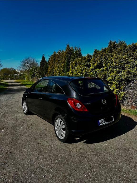 Second-hand Opel Corsa 60 CP (44 kW) 2009 Negru Hatchback