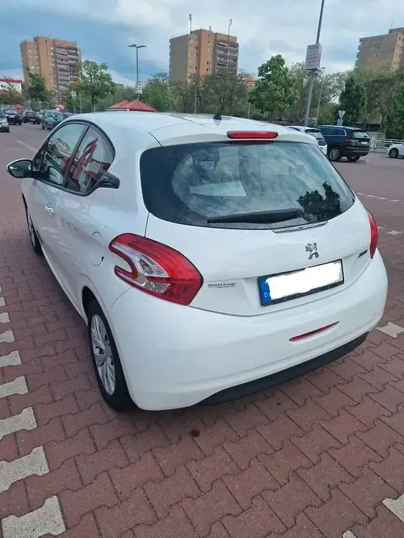 Gebraucht Peugeot 208 Active 82 PS (60 kW) 2014 Weiß Kleinwagen
