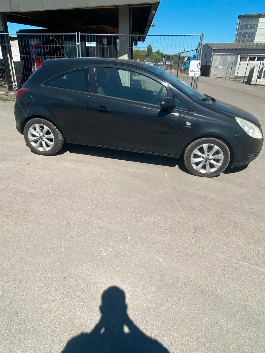 Second-hand Opel Corsa 101 CP (74 kW) 2013 Negru Hatchback