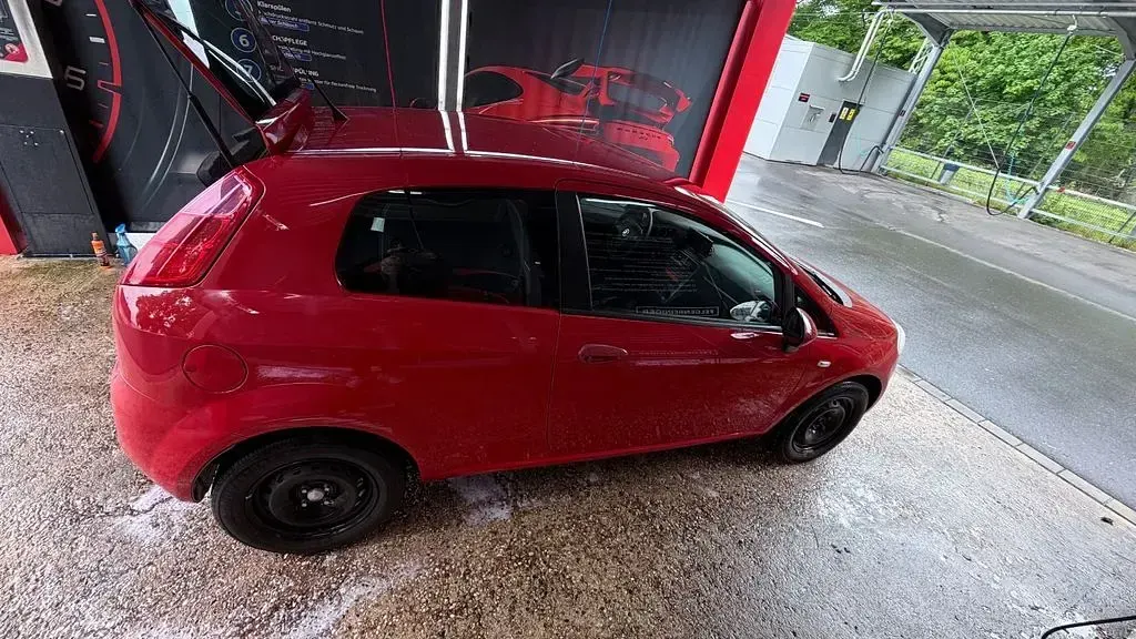 Gebraucht Fiat Grande Punto 77 PS (56 kW) 2009 Rot Kleinwagen
