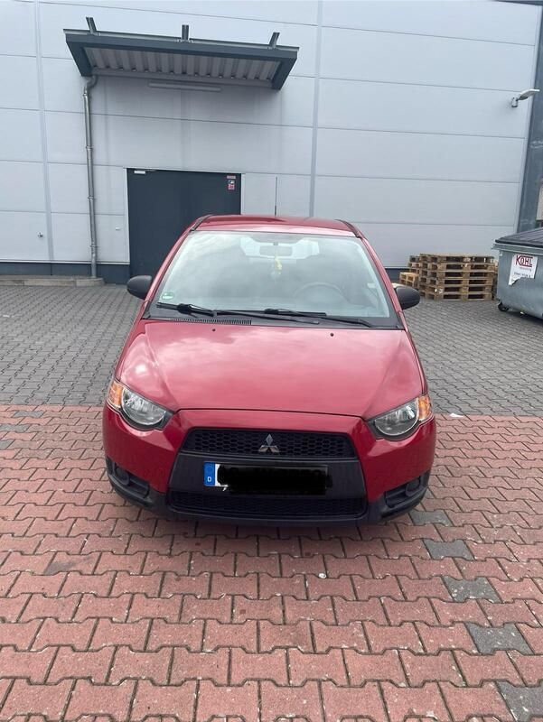 Rot Gebraucht 2009 Mitsubishi Colt Kleinwagen | 3.999 € (Teuer) - Bild 1/4