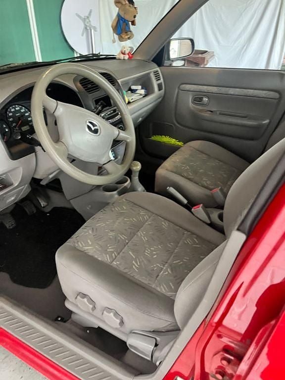 Gebraucht Mazda Demio Basis 63 PS (46 kW) 2002 Rot Kleinwagen