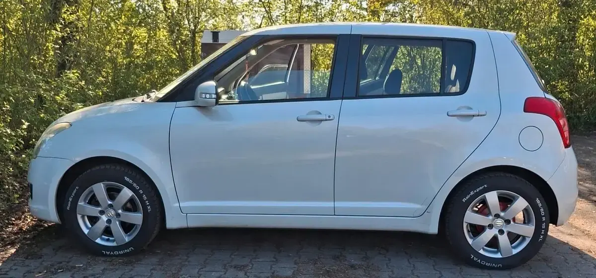 Gebraucht Suzuki Swift 92 PS (67 kW) 2010 Weiß Kleinwagen