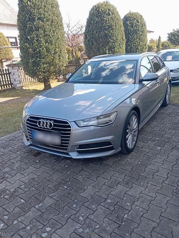Second-hand Audi A6 190 CP (139 kW) 2015 Argintiu Break