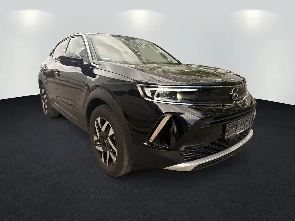 Gebraucht Opel Mokka-e Elegance 100 kW (136 PS) 2022 Diamant schwarz/karbon schwarz SUV