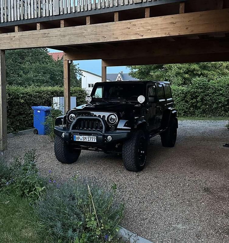 Gebraucht 2011 Jeep Wrangler Unlimited Sahara SUV | 28.800 € - Bild 1/4