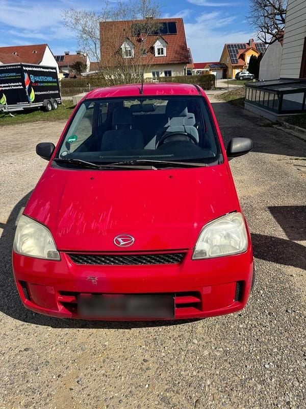 Gebraucht Daihatsu Cuore 58 PS (42 kW) 2003 Rot Kleinwagen