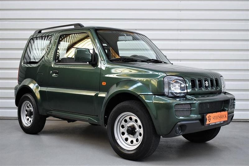 Grün Gebraucht 2011 Suzuki Jimny Style SUV | 15.990 € (Fairer Preis) - Bild 1/4