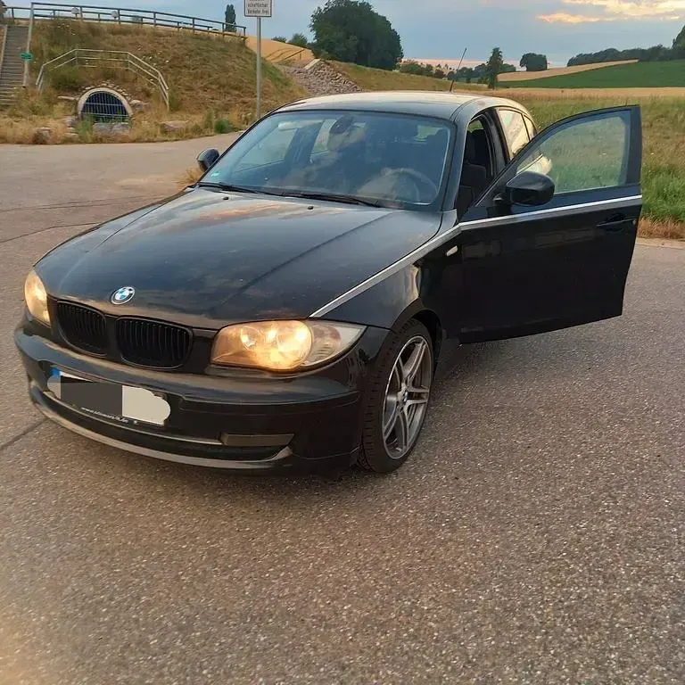 Gebraucht BMW 116 Performance 122 PS (89 kW) 2011 Schwarz Kleinwagen