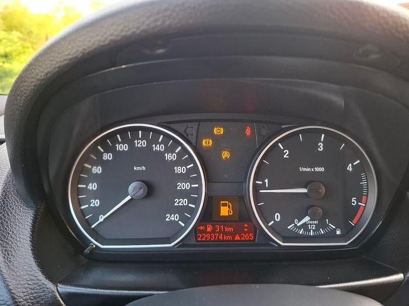 Second-hand BMW 118 Performance 143 CP (105 kW) 2010 Maro Hatchback