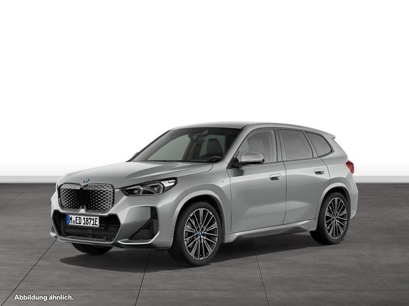 Grau Gebraucht 2024 BMW iX1 SUV | 46.637 € (Etwas zu teuer) - Bild 1/4