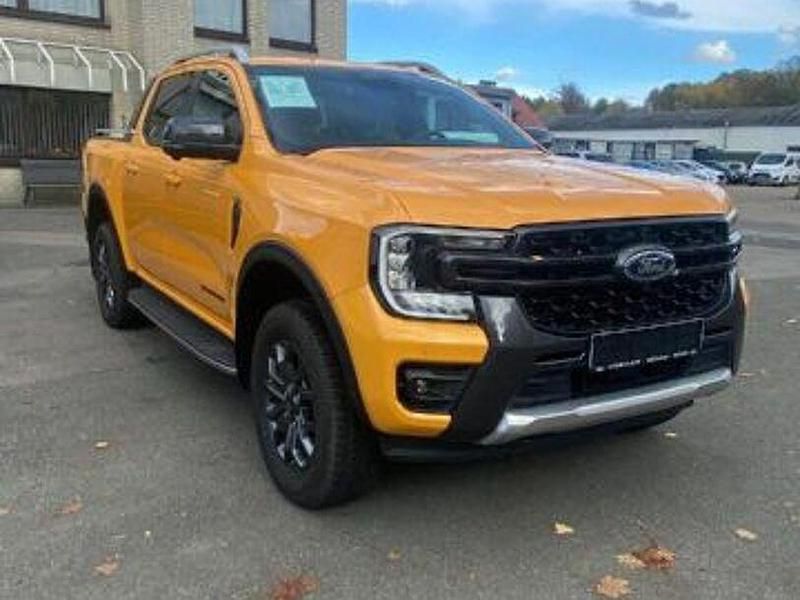 Cyber orange 3c Gebraucht 2023 Ford Ranger Wildtrack Abholung | 39.900 € (Fairer Preis) - Bild 1/4